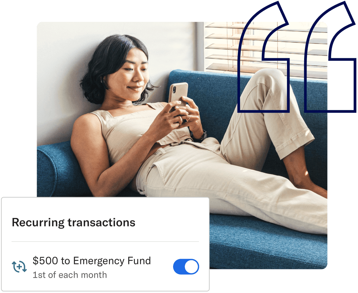 Person on a phone next to a user interface card showing recurring transaction of $500 to emergency fund toggled on.